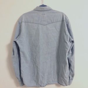 Eidos western denim shirt with snap buttons.